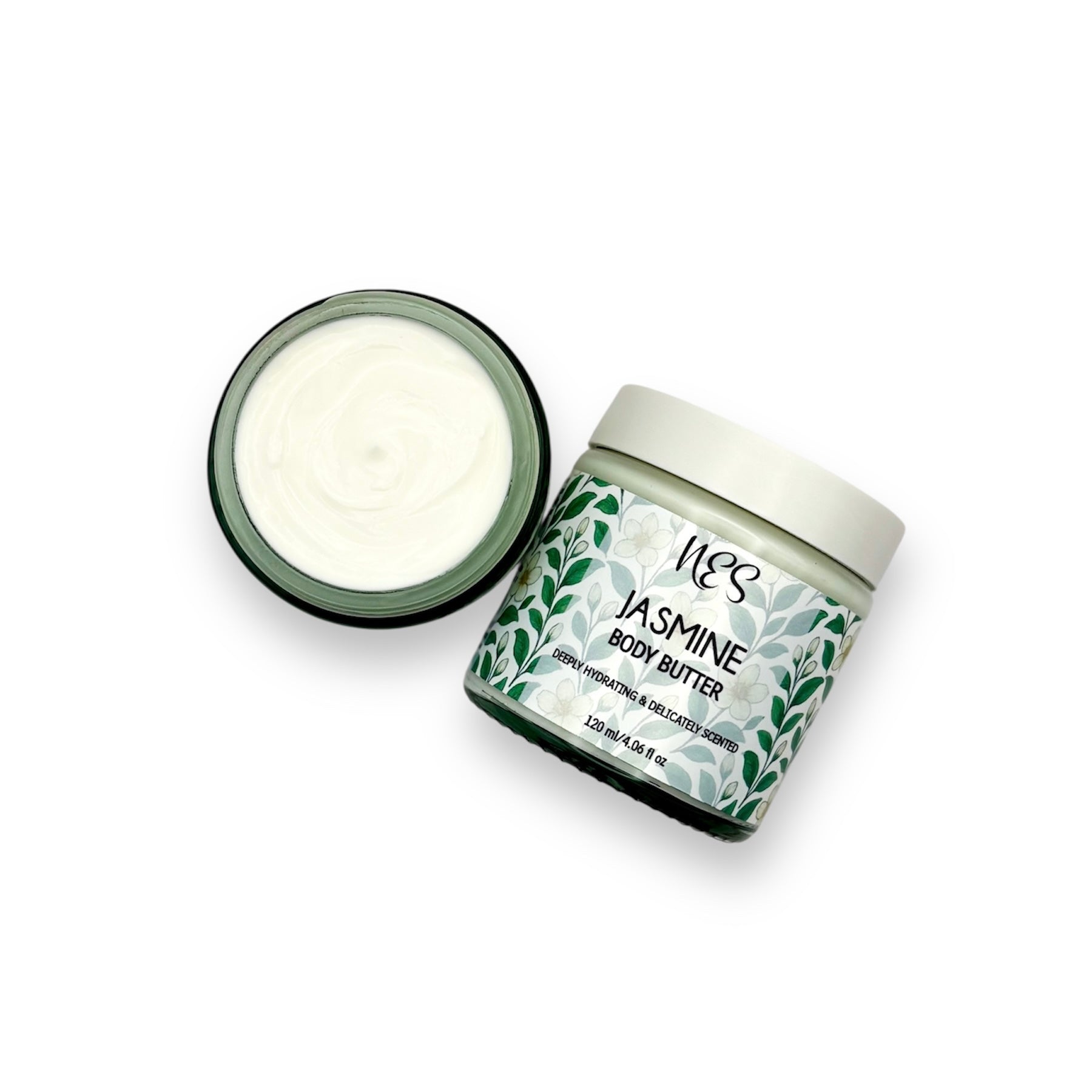 NES Jasmine Body Butter open jar showing creamy texture, deeply hydrating vegan skincare in glass packaging