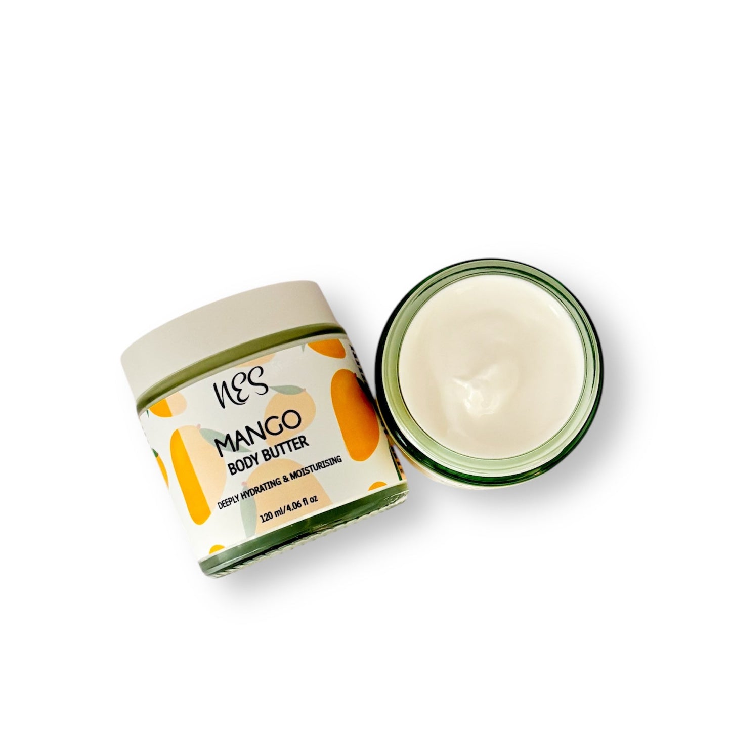 Open NES Mango Body Butter jar showing rich, creamy texture – nourishing, vegan skincare for dry and sensitive skin.