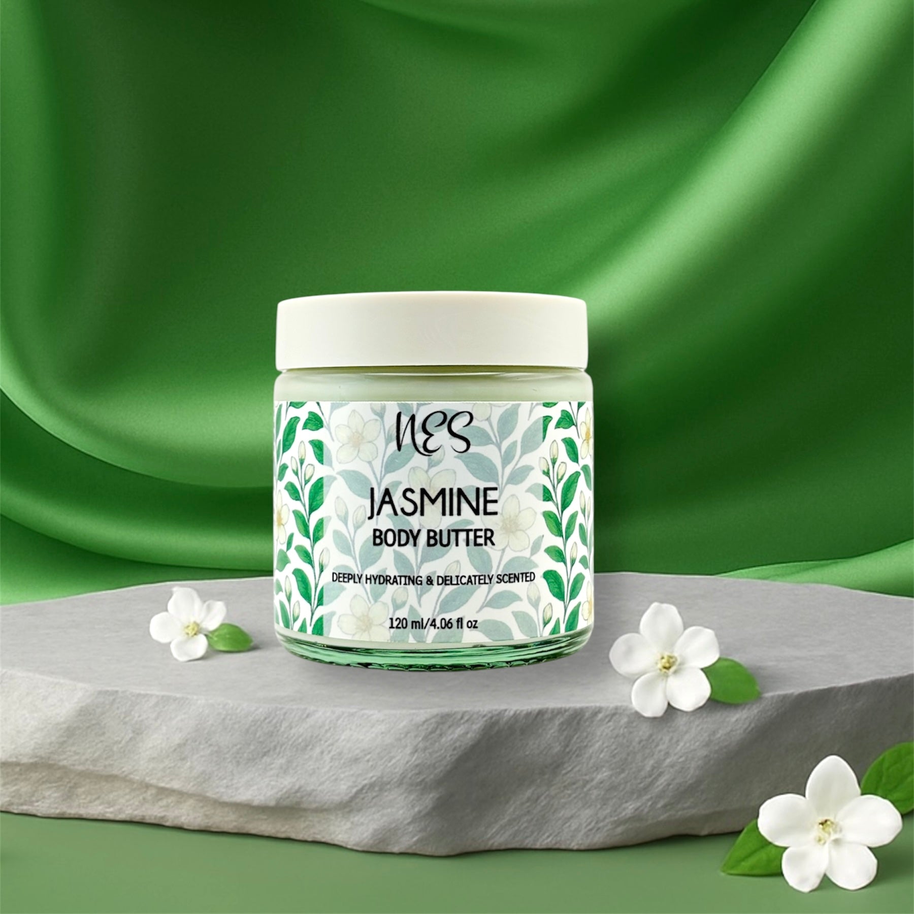 NES Jasmine Body Butter jar on stone with jasmine flowers, deeply hydrating, delicately scented, vegan and cruelty-free natural skincare handcrafted in Dunedin, New Zealand.