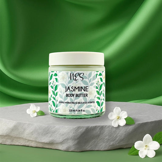 NES Jasmine Body Butter jar on stone with jasmine flowers, deeply hydrating, delicately scented, vegan and cruelty-free natural skincare handcrafted in Dunedin, New Zealand.