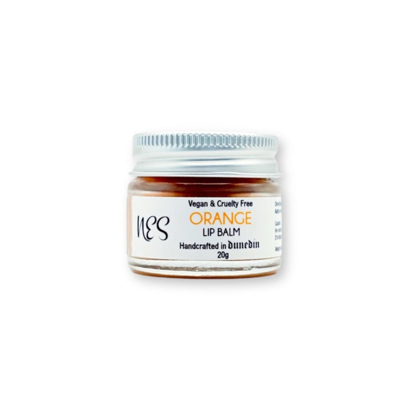 NES Orange Lip Balm in a small glass jar with a silver lid, handcrafted in Dunedin, NZ. Vegan, cruelty-free, and enriched with nourishing oils for soft lips.