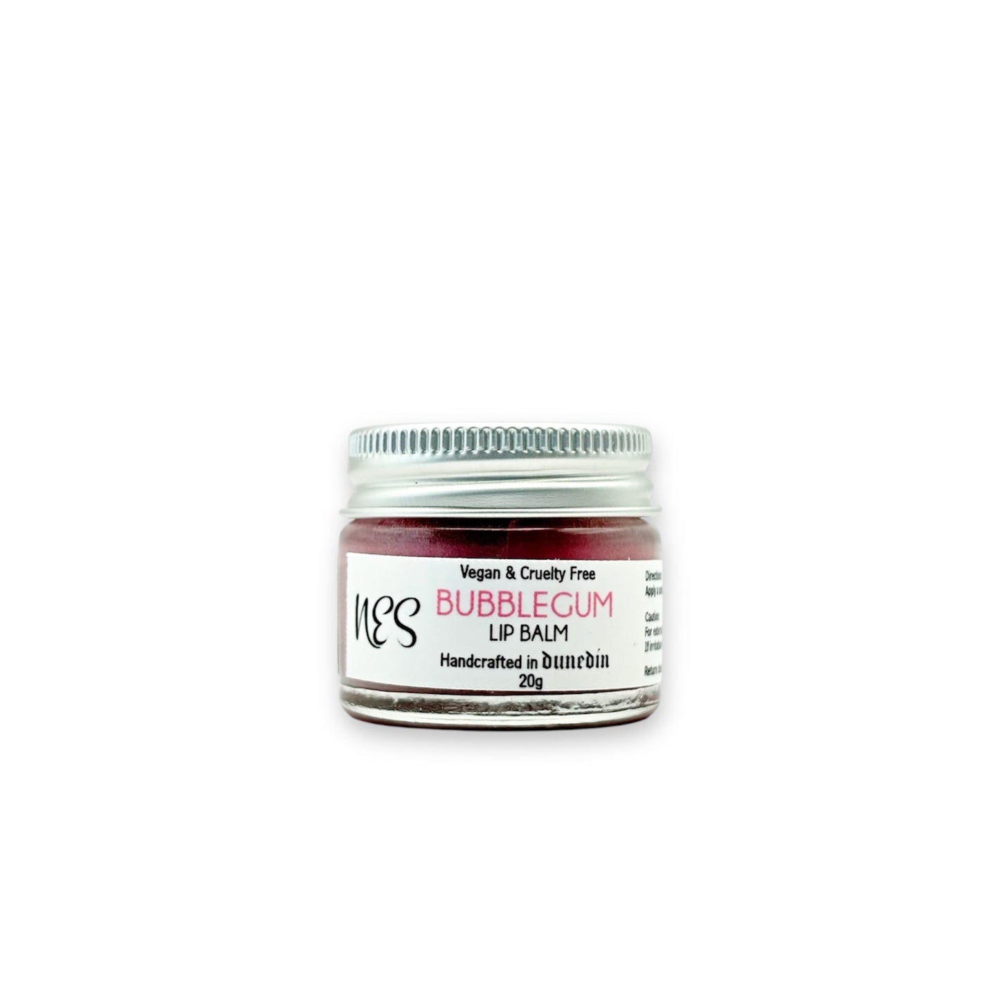 Bubblegum lip balm in a small glass jar with an aluminum lid – vegan and cruelty-free lip care from NES Soap NZ.