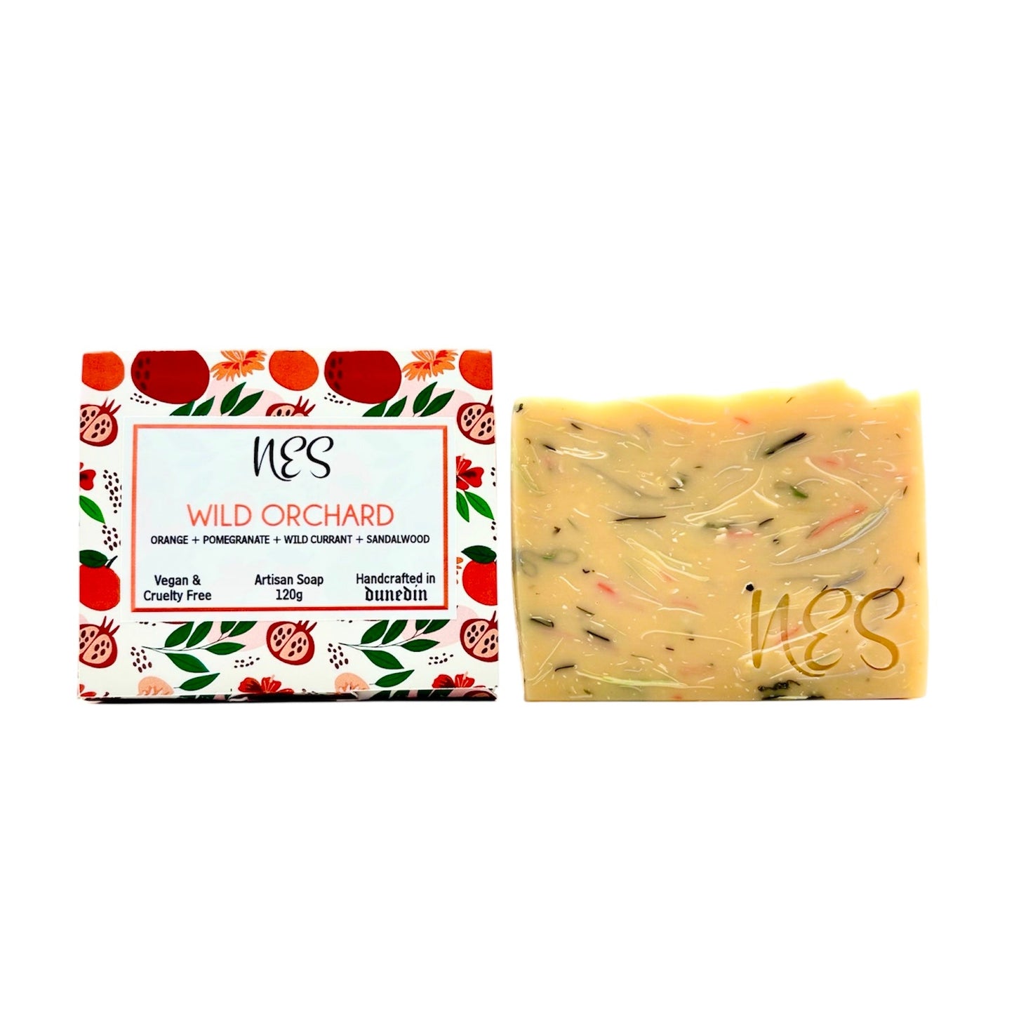 NES Wild Orchard Artisan Soap shown with its illustrated packaging featuring pomegranate and orange designs – vegan and handcrafted in Dunedin.